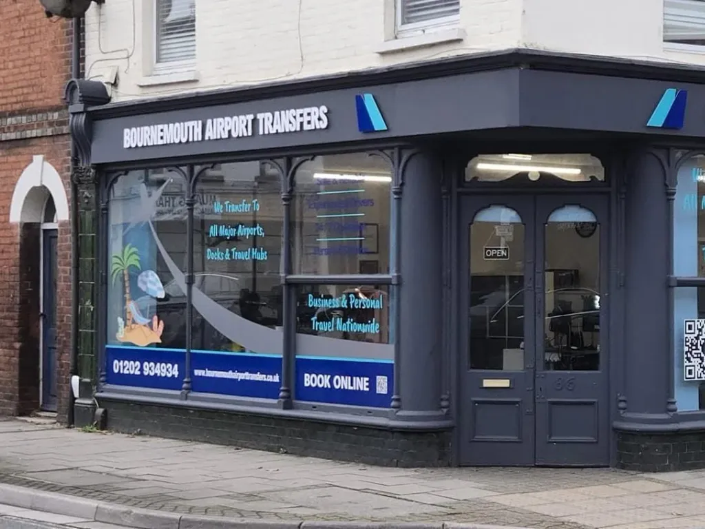 The Bournemouth Airport Transfers shopfront on a street corner