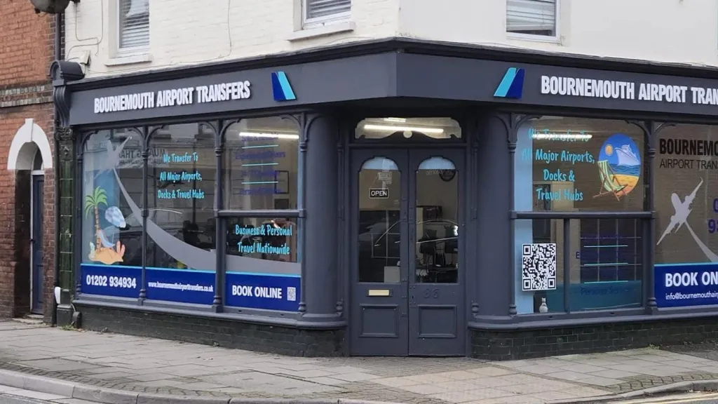 The Bournemouth Airport Transfers office in Christchurch, with branded signage across the corner shopfront